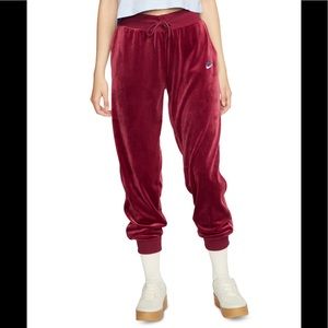 Nike Women's Sportswear Velour
Heritage Joggers COLOR: Team Red/University Blue